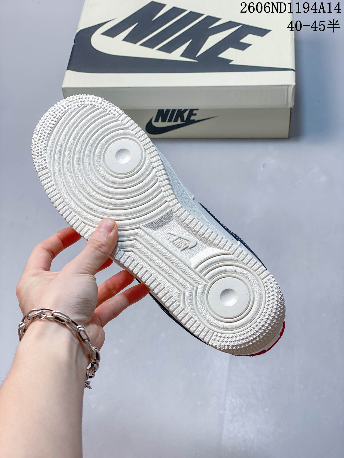 View of the white circular-pattern outsole on the low-top sneaker