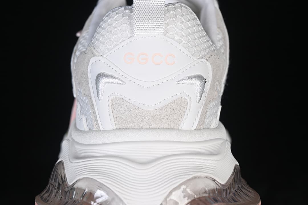 Close-up of the sneaker heel with mesh, layered trim, and GG-CC lettering.