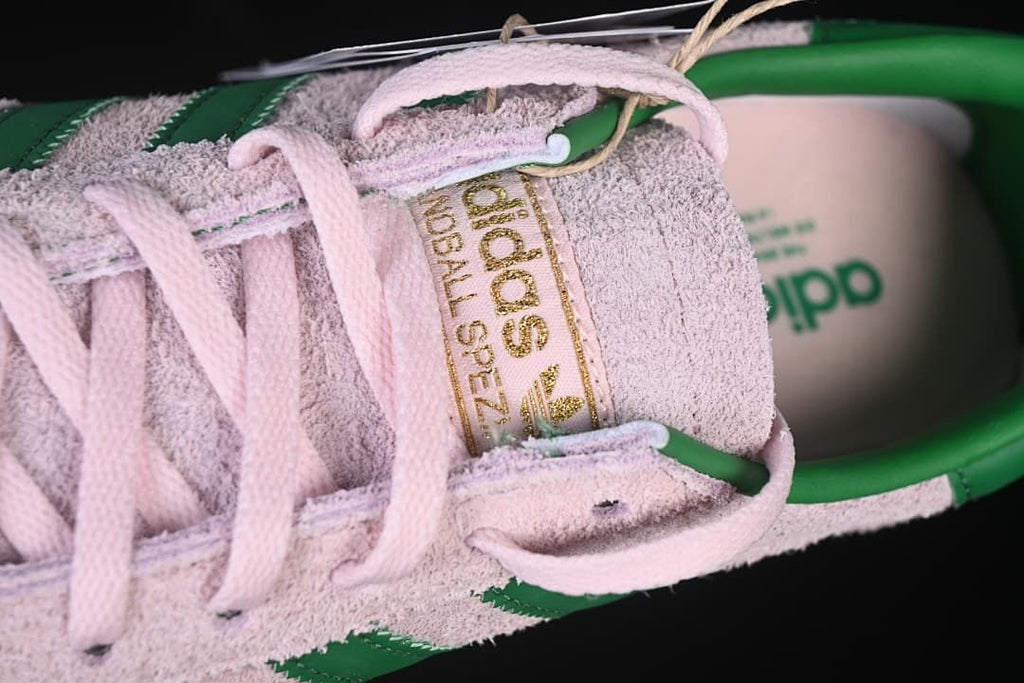 Close-up of the tongue label and pink laces