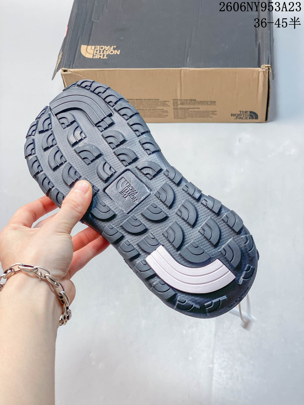 Close-up of the sandal outsole showing its lugged tread pattern.