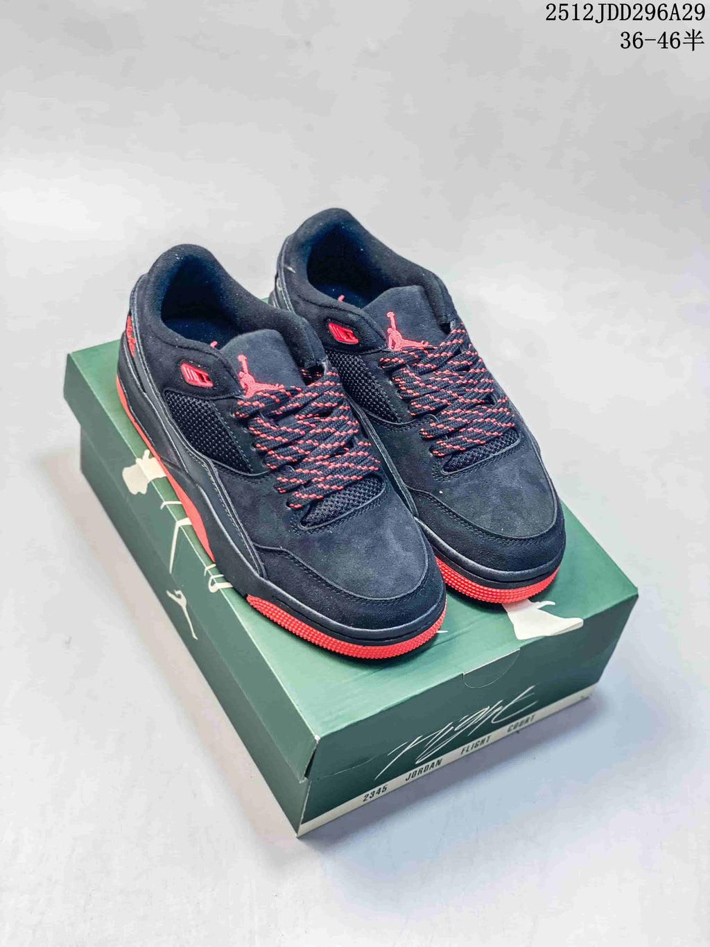 Pair of black and red Jordan Flight Court sneakers displayed on a green shoebox