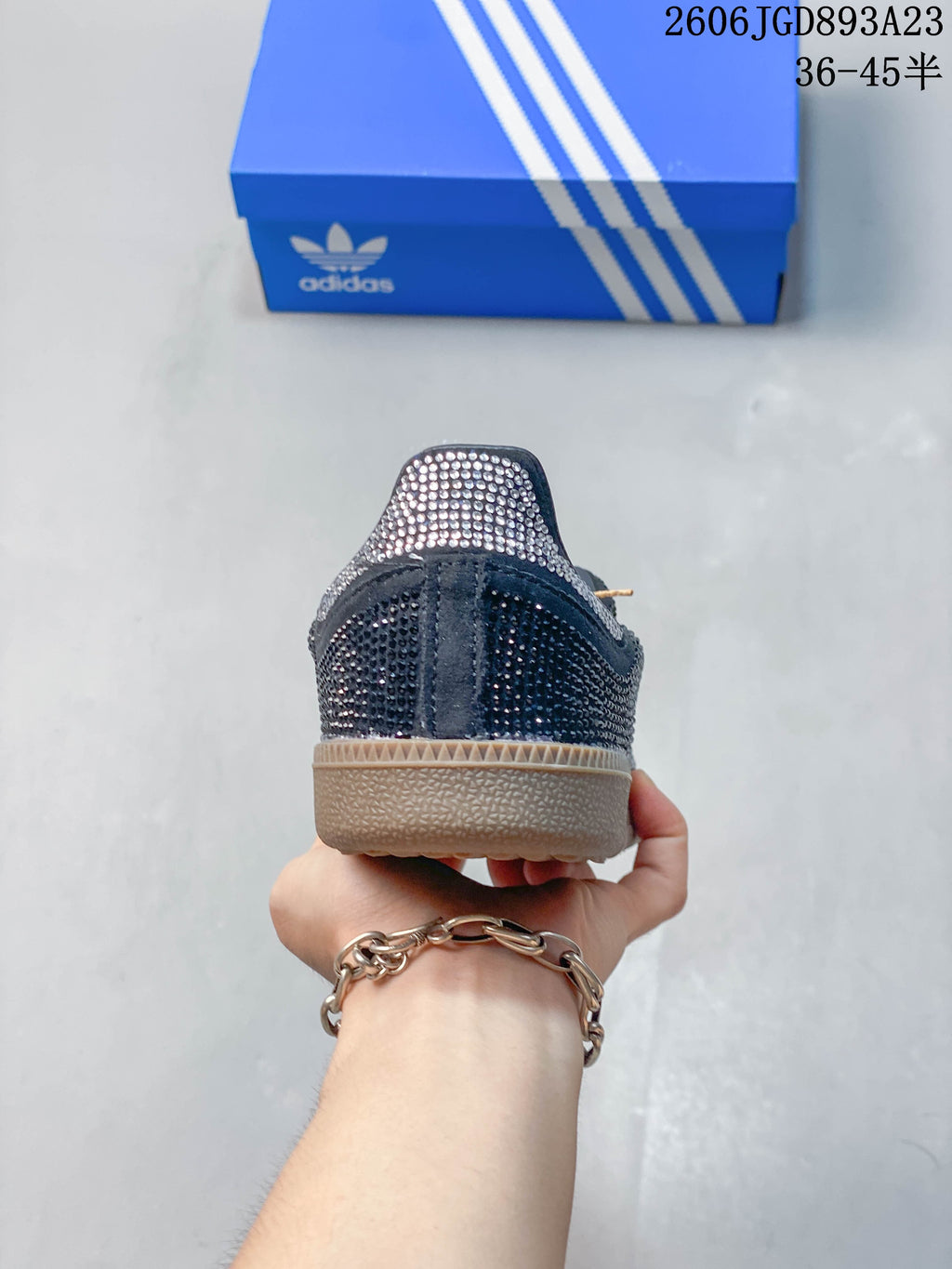 Rear view showing the embellished heel and gum-colored sole