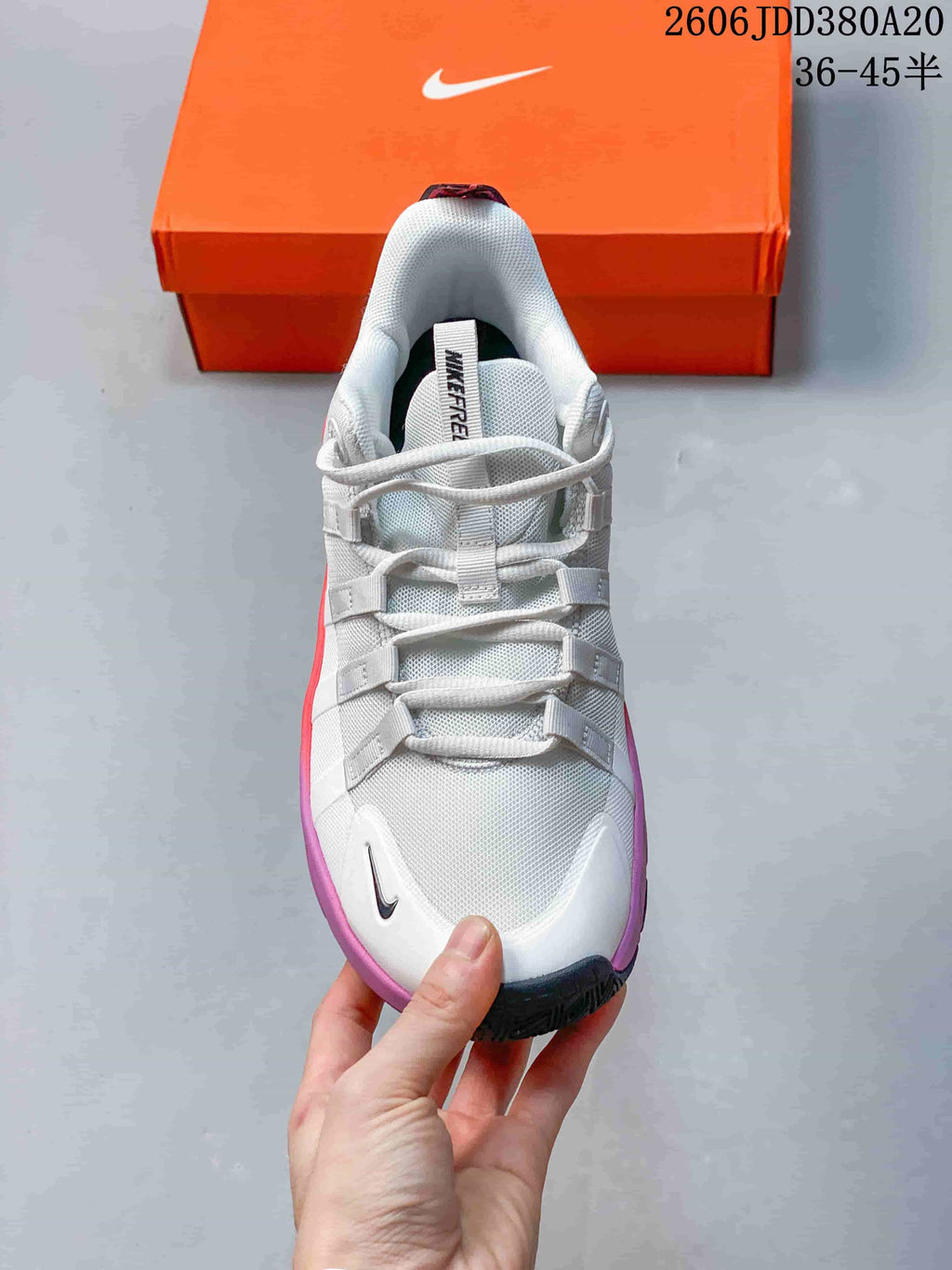 Top view of the lace-up white mesh-look upper and toe of the Nike Free Metcon 7.