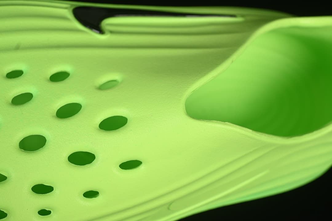 Close-up of the perforated upper and heel opening.