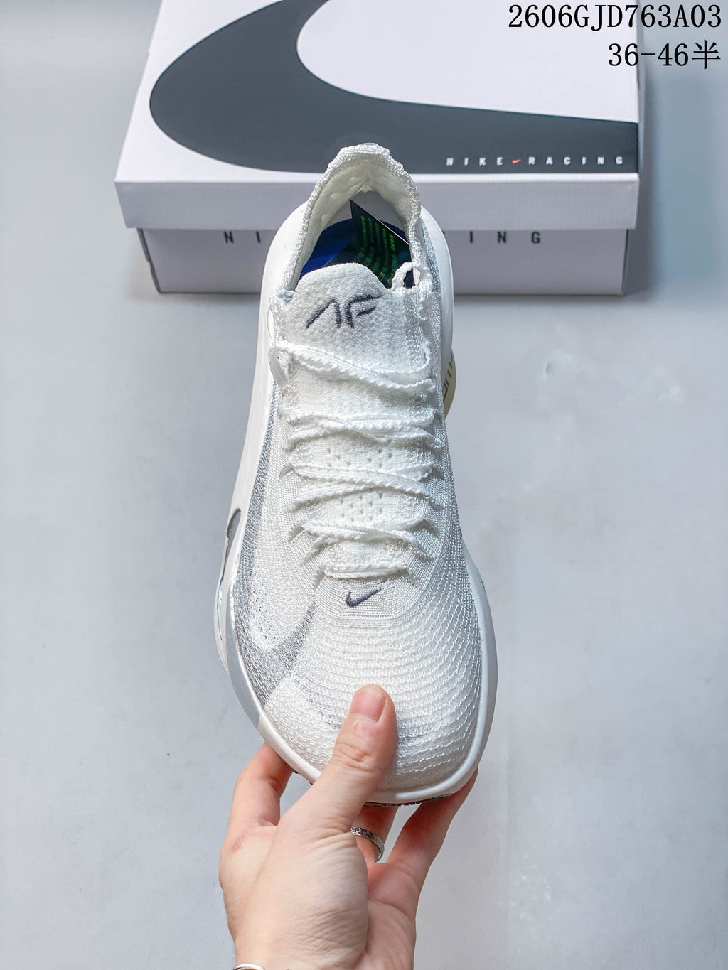 Front view of a silver-gray and white Nike Alphafly 3 shoe