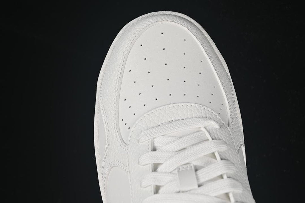 Top view of the perforated toe and laces