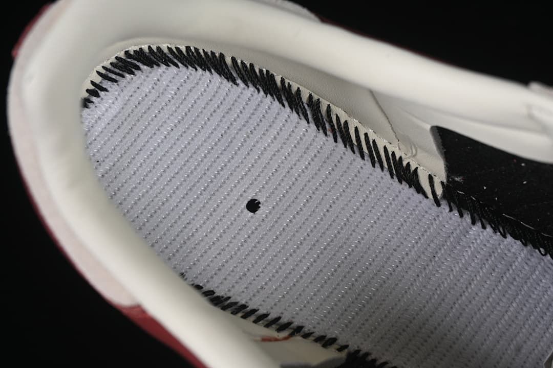 Close-up of the shoe's interior lining and stitching