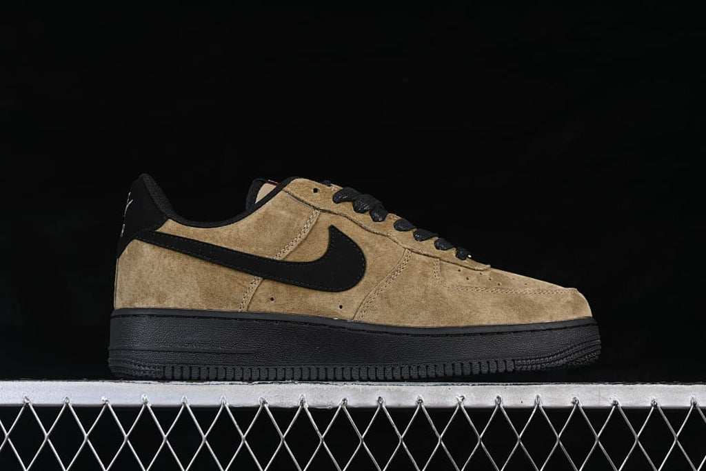 Side view of a khaki and black Nike Air Force 1 ’07 low-top sneaker
