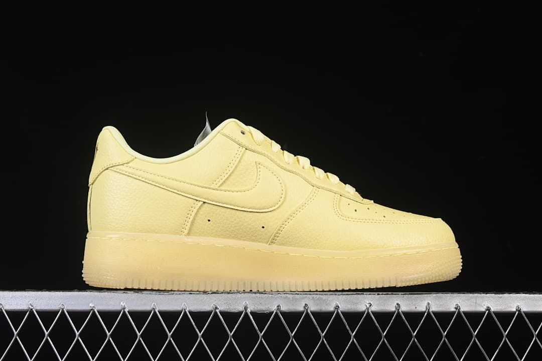 Side profile of the pale yellow sneaker