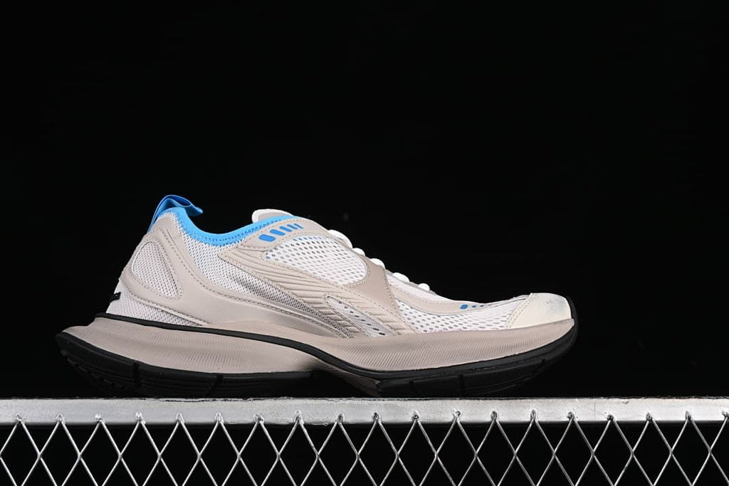 Side profile showing the layered upper and sole