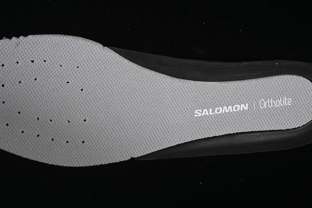 Close-up of the insole printed with Salomon and Ortholite branding.
