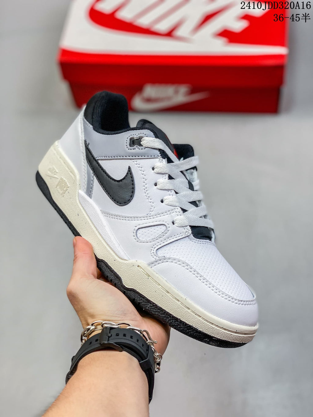 Close side view of the white and black low-top sneaker