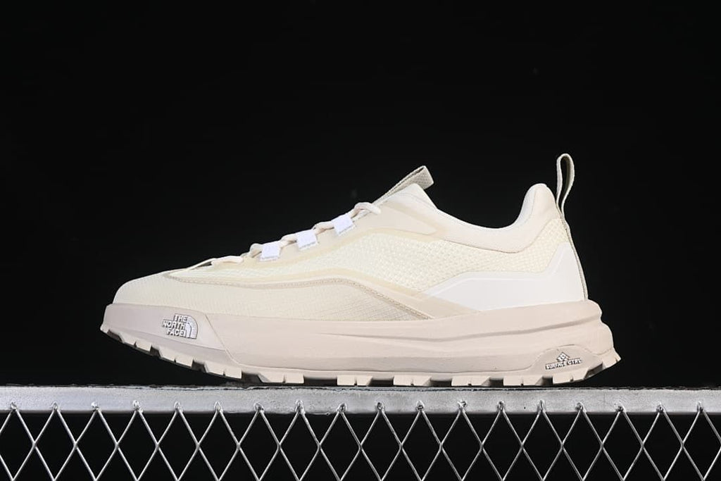 Side profile of a light-colored The North Face Offtrail V E low-cut outdoor shoe