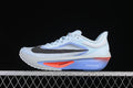 Side profile of light blue Nike Zoom Fly 6 running shoe with black Swoosh and violet and coral sole accents.
