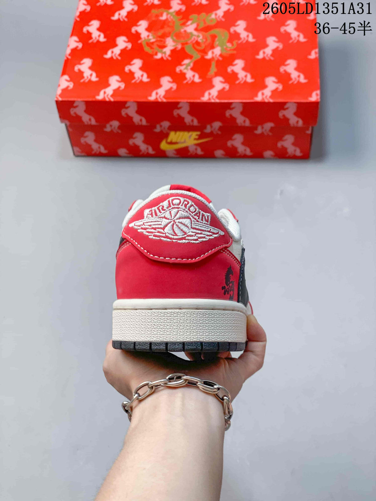 Rear view showing the red heel panel and embroidered winged logo