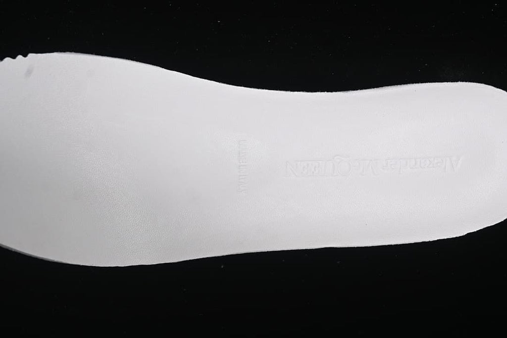 Close-up of the insole with embossed Alexander McQueen branding