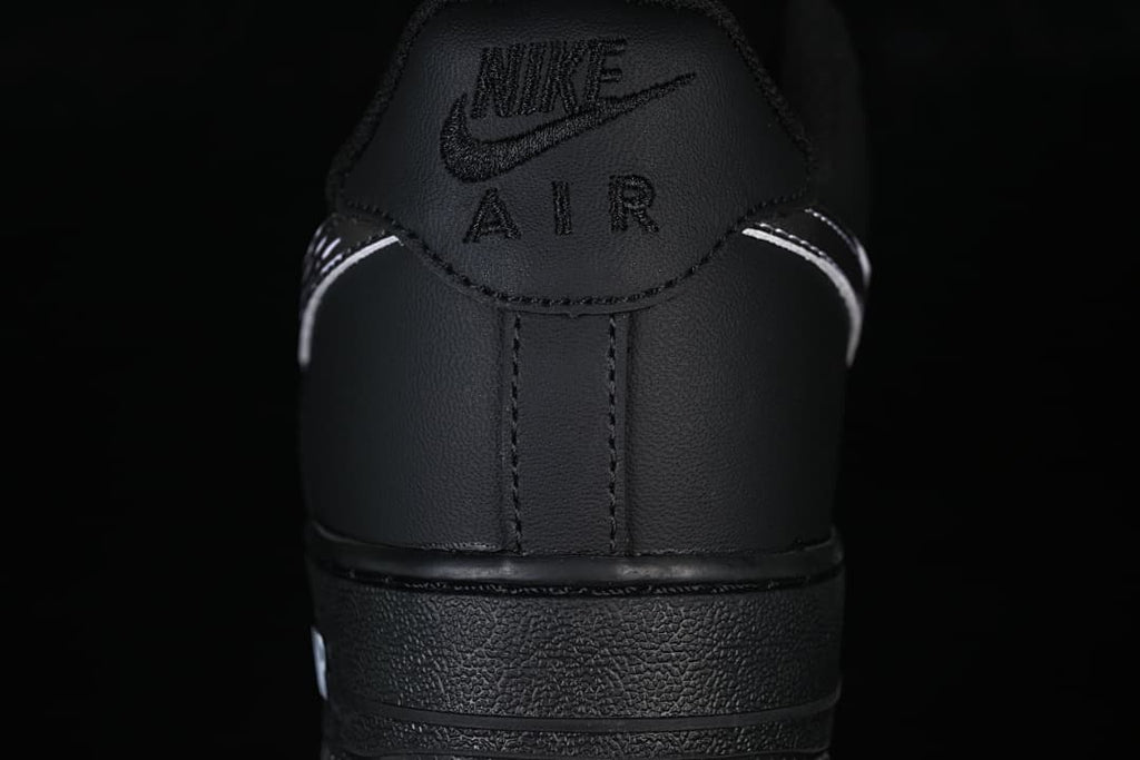 Rear view of the black sneaker with Nike Air branding