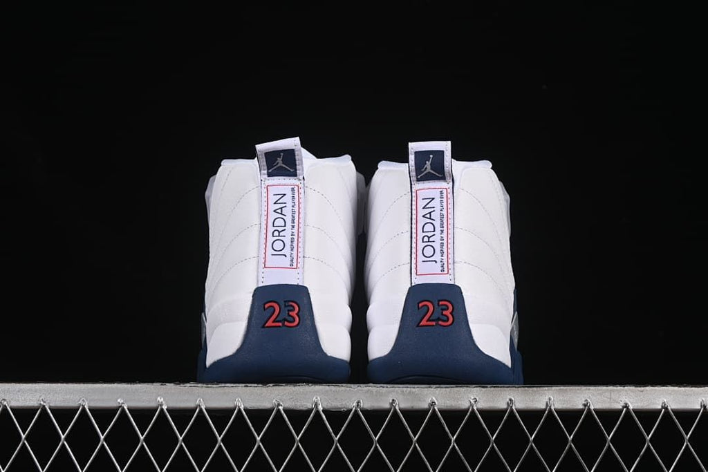 Rear view of the pair with Jordan heel labels and red 23 accents