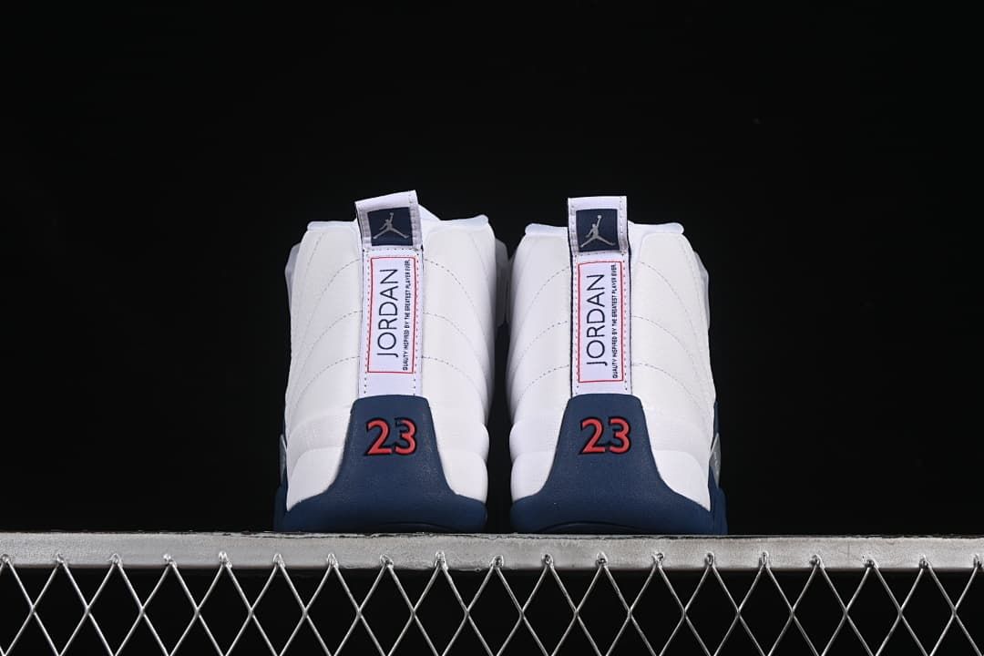 Rear view of the pair with Jordan heel labels and red 23 accents