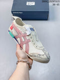 Onitsuka Tiger Mexico 66 sneaker in a light colorway with pink and green side stripes, shown with its shoe box.