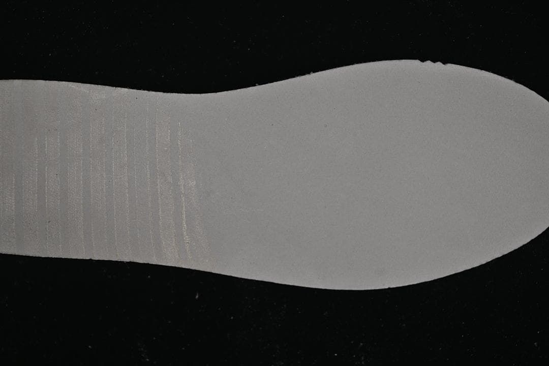 Grey outsole viewed from below