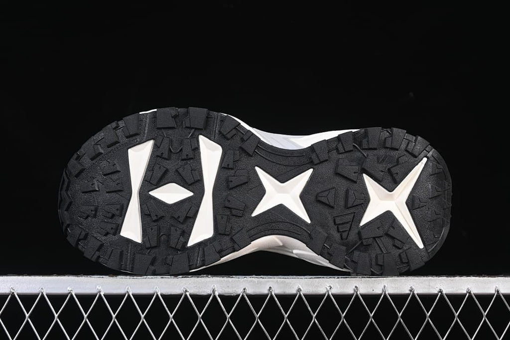 Outsole view showing the patterned black tread