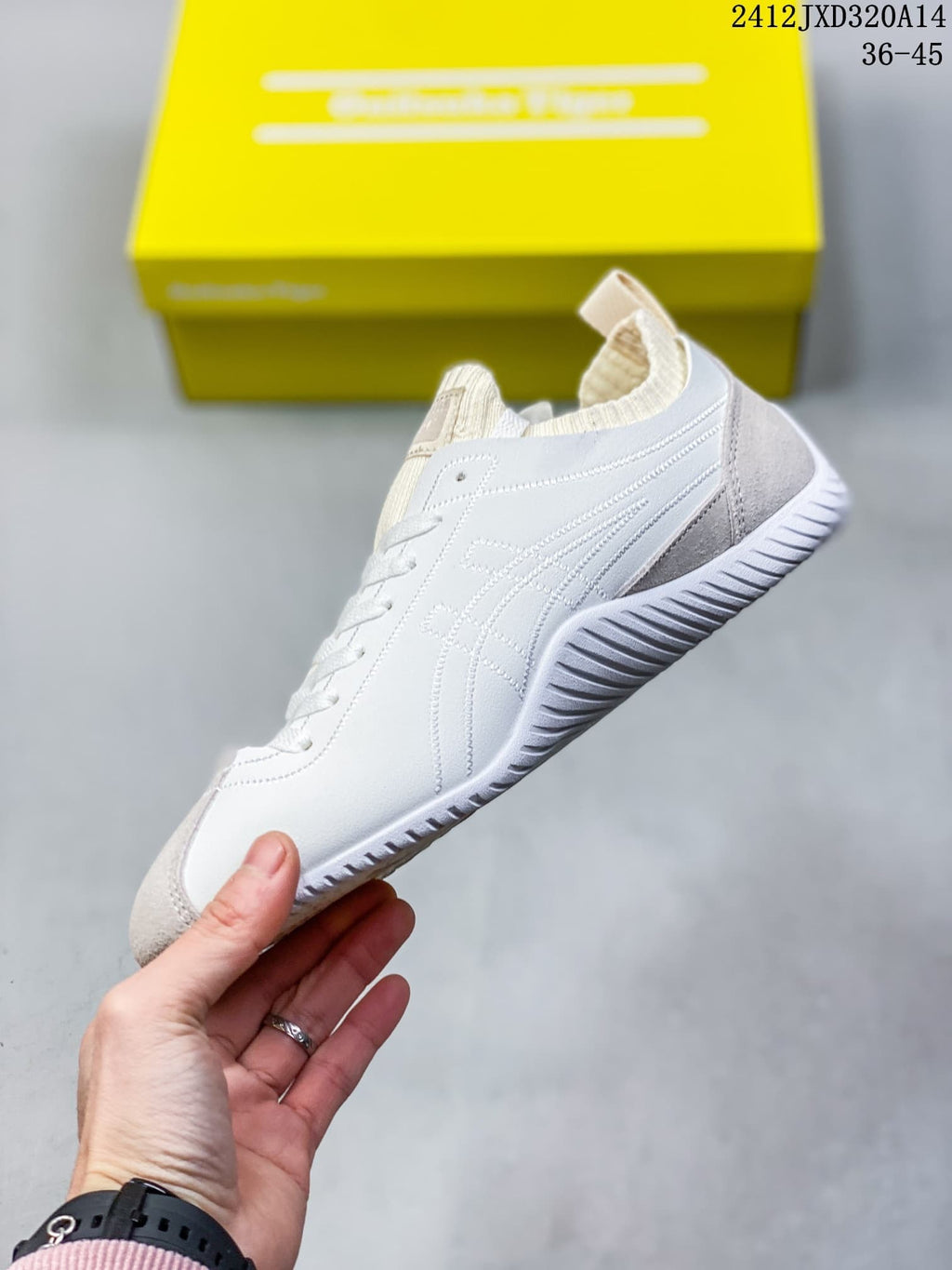 Side profile showing the low-top shape and stitched detailing