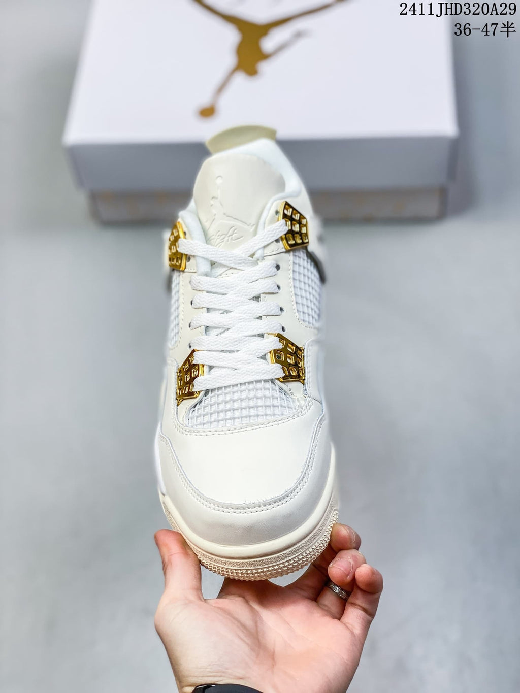 Front view highlighting the laces, mesh panels and gold-tone hardware