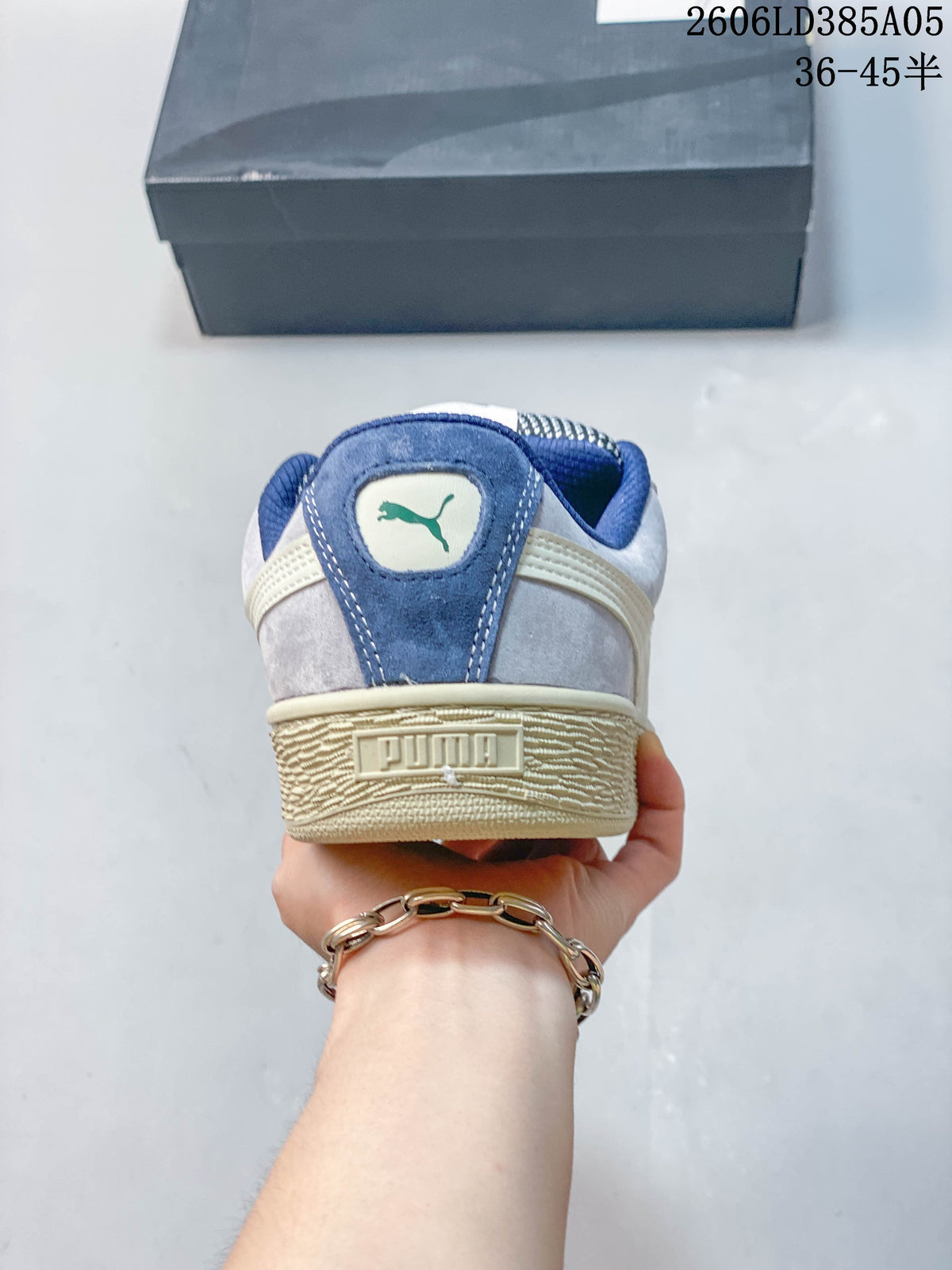 Rear view showing the heel details and textured cream-colored sole