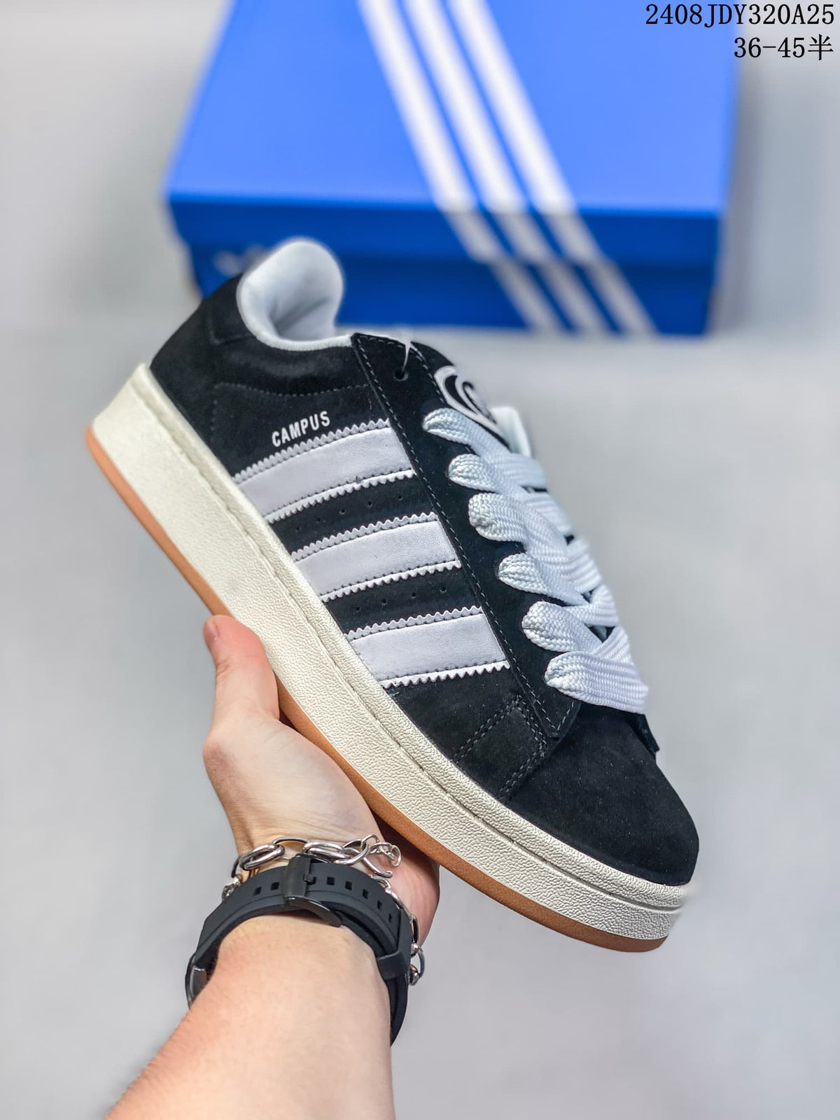 Angled side view of a black adidas Campus sneaker with three light-colored stripes and white laces.