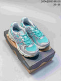 Pair of silver and turquoise ASICS GEL-KAYANO 12.1 running shoes shown from above.