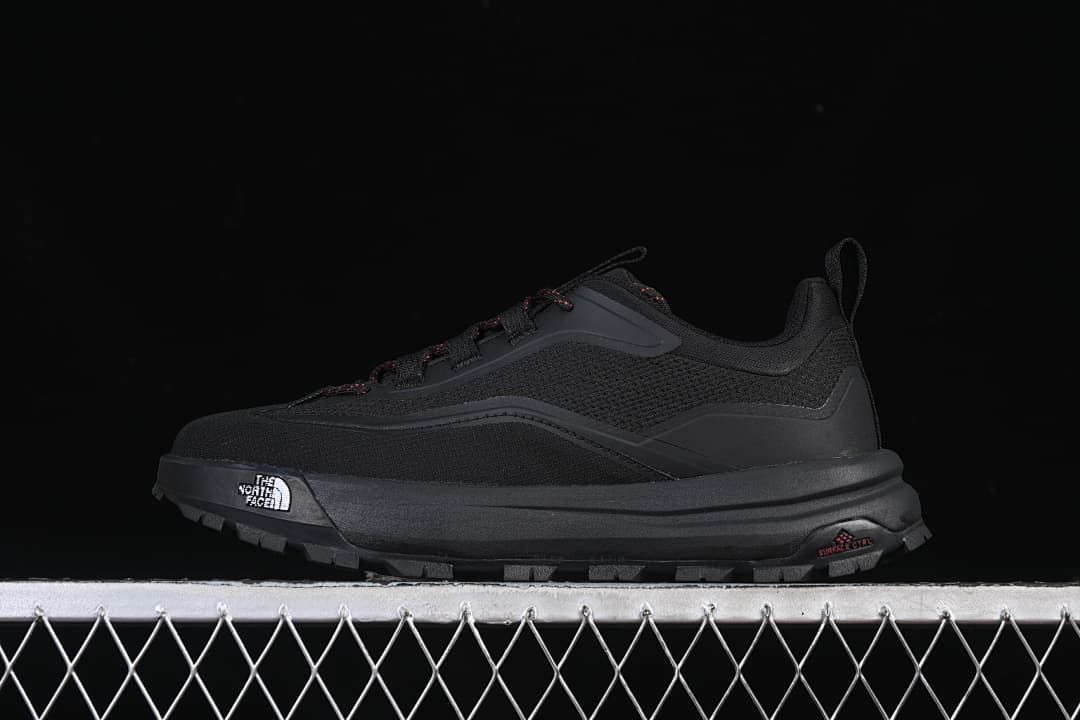 Black The North Face Offtrail Ve low-top shoe with red-accented laces, shown in profile