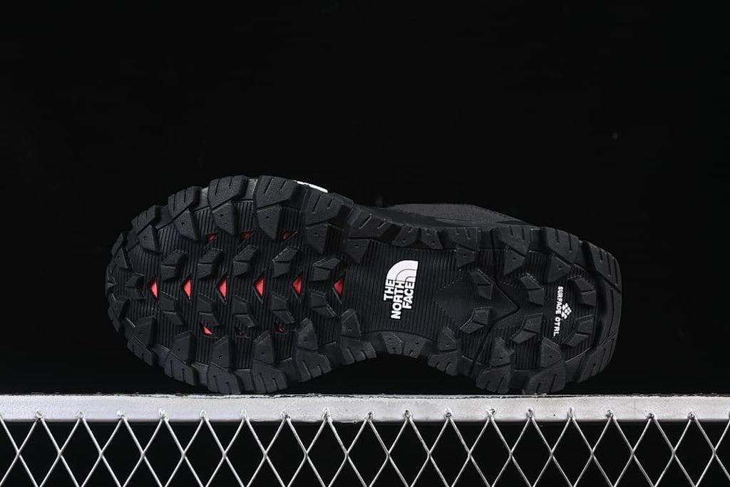 Underside view showing the lugged outsole tread