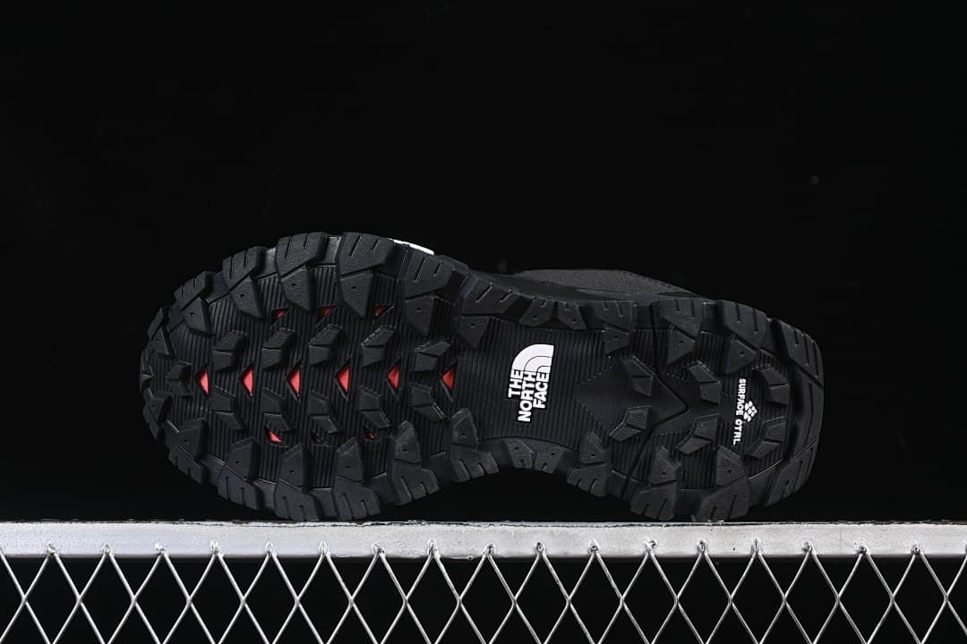 Underside view showing the lugged outsole tread
