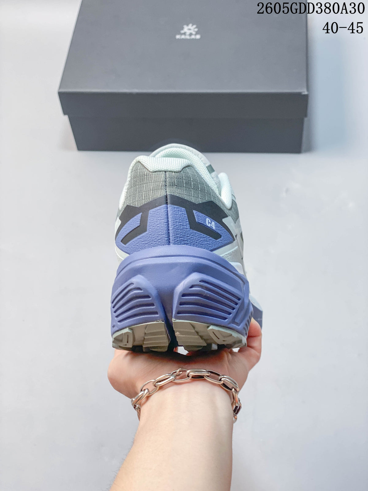 Rear view of the Kailas C4 shoe showing its violet heel structure and outsole.