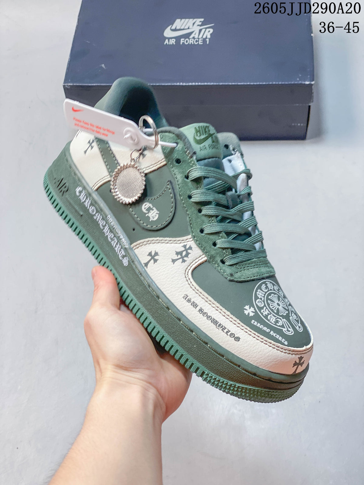 Angled side view of the sneaker with patterned panels and a metal charm