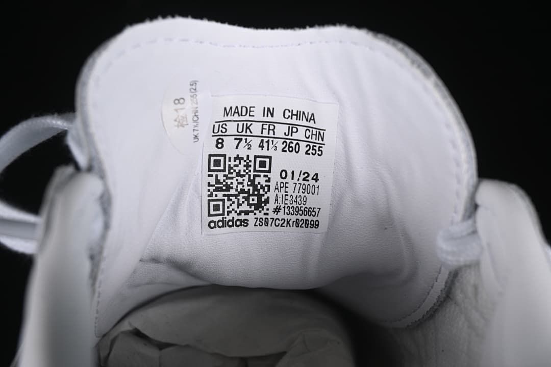 Tongue size label showing US 8, UK 7.5, EU 41 1/3, and style code IE3439