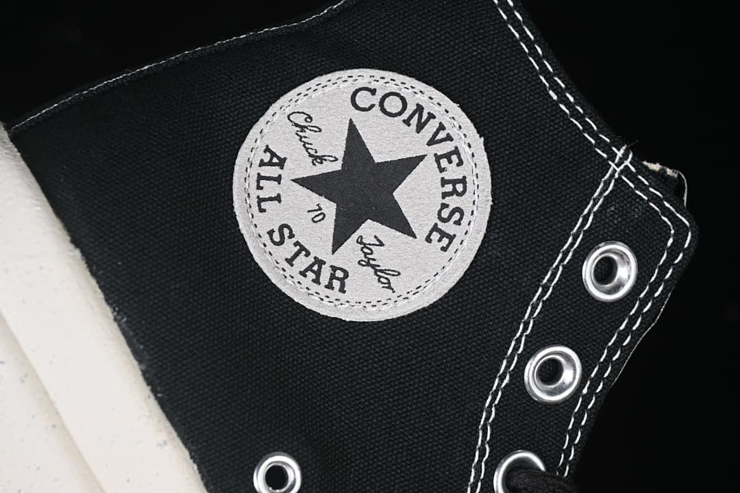 Close-up of the Chuck 70 ankle patch and metal eyelets