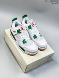 Pair of white and green mid-top sneakers shown from the front on a box