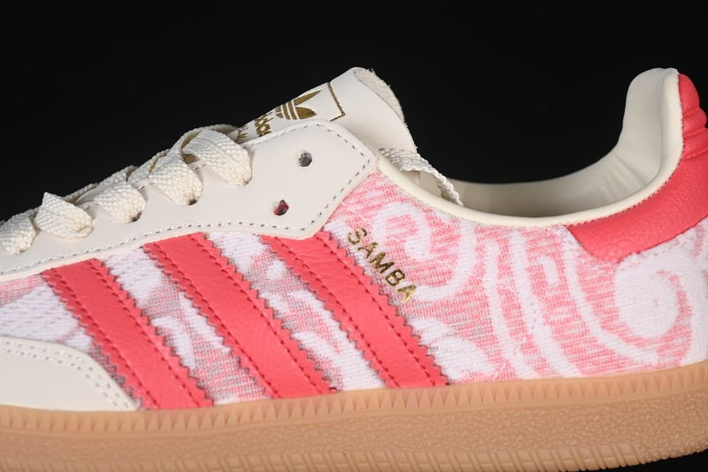 Close-up of the pink stripes, patterned upper, and Samba side lettering