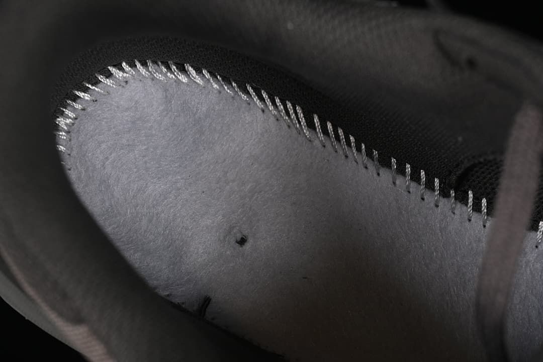 Close-up of the shoe interior lining and stitched edge
