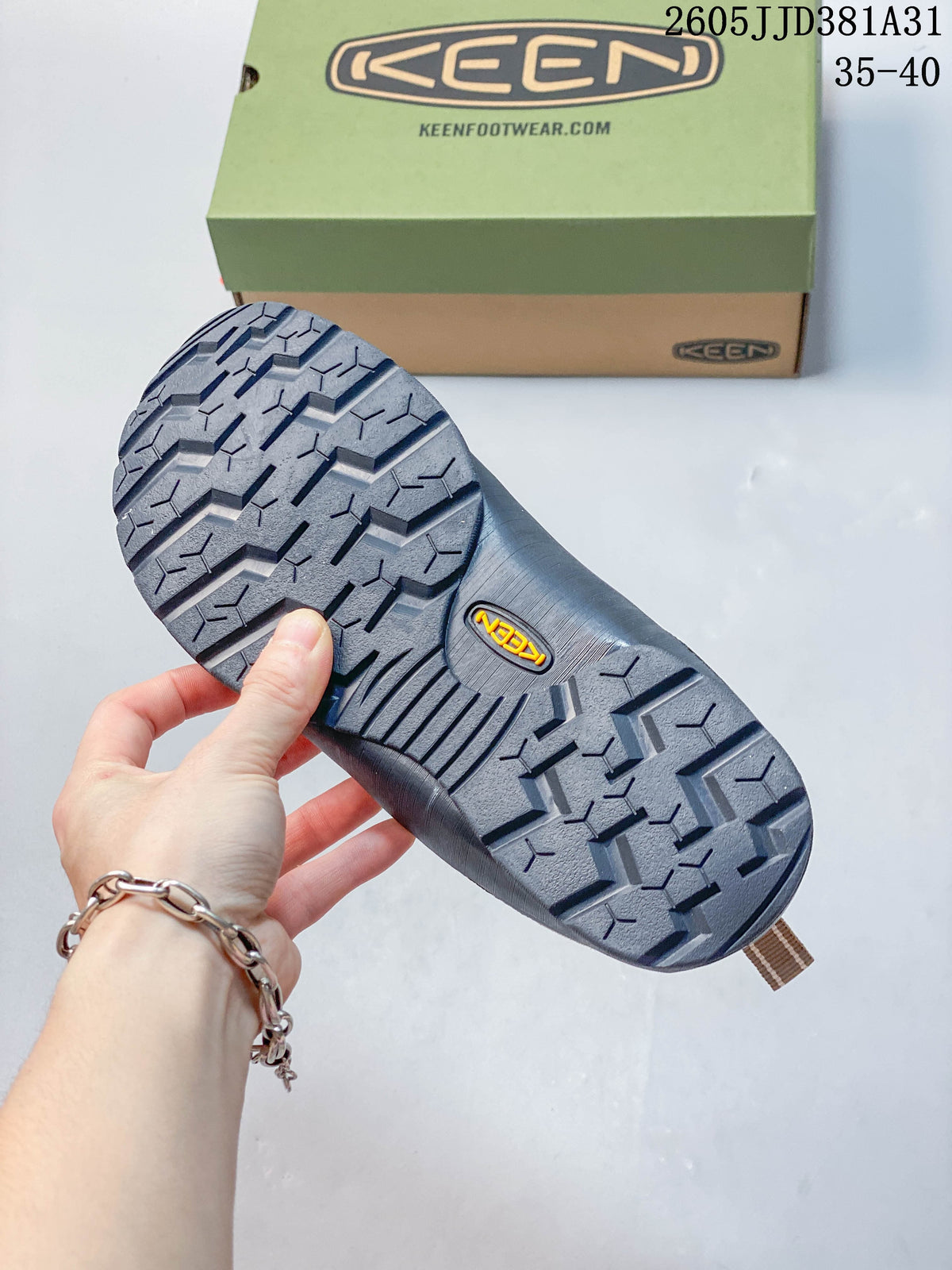Close-up of the sneaker outsole and KEEN shoebox