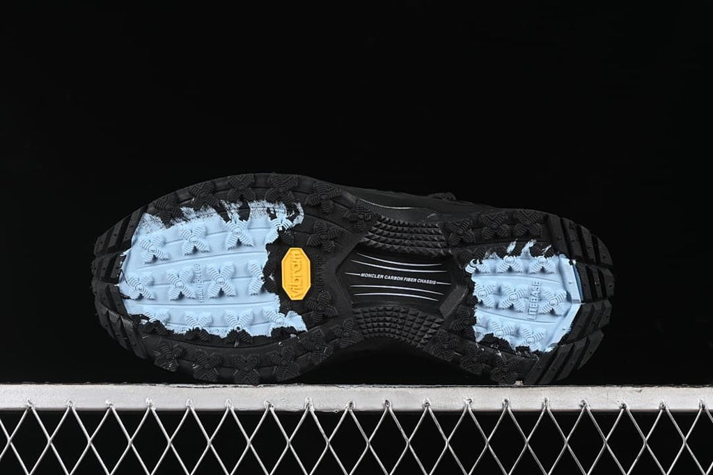 Underside view showing the patterned outsole and contrasting sections