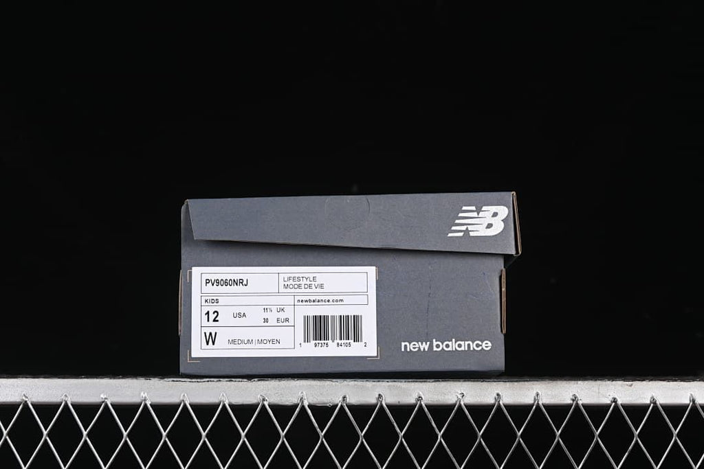 New Balance shoe box label showing the kids sizing for the photographed sample.