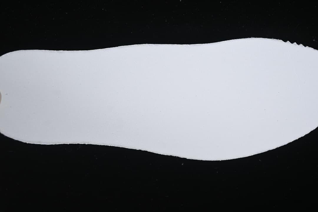 Plain white insole shown from above