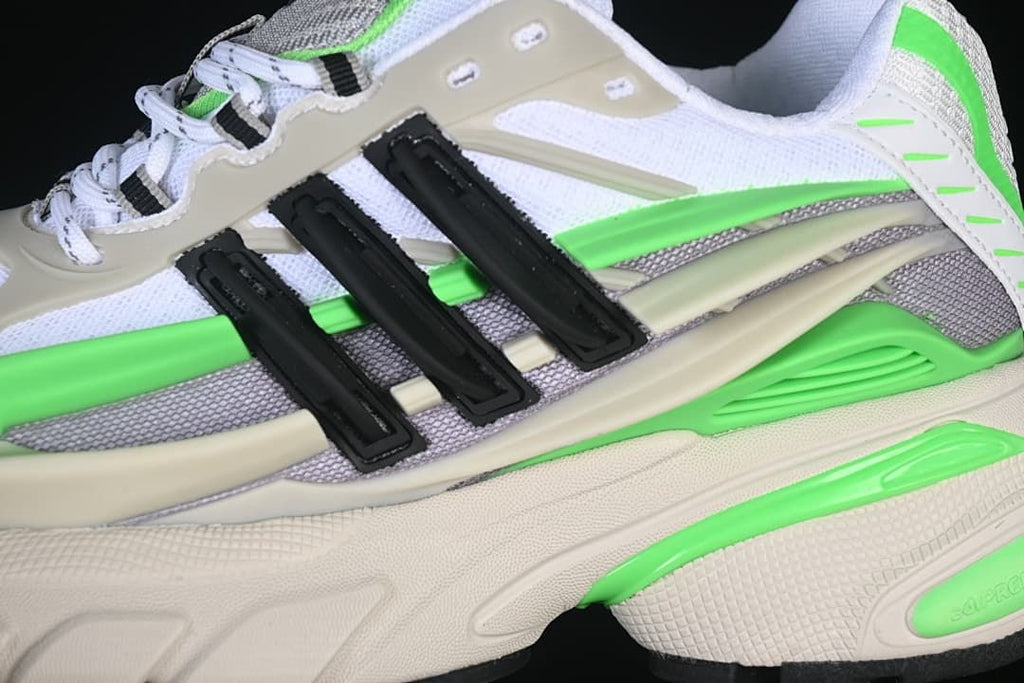 Close-up of the layered side panels, black stripes, and sculpted midsole.
