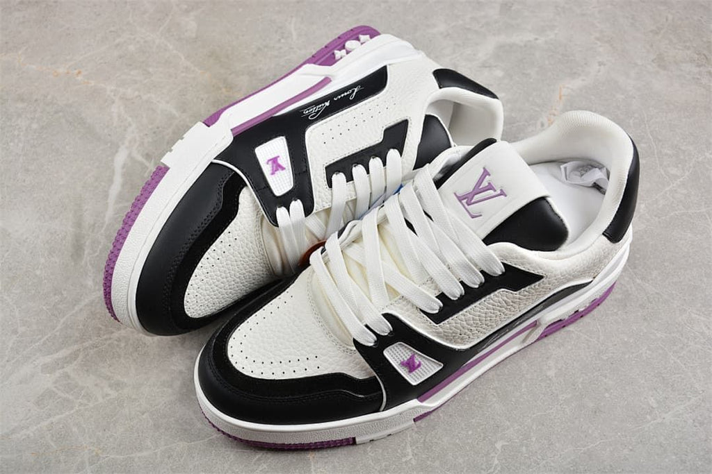 Pair of white, black, and purple low-top sneakers viewed from above at an angle