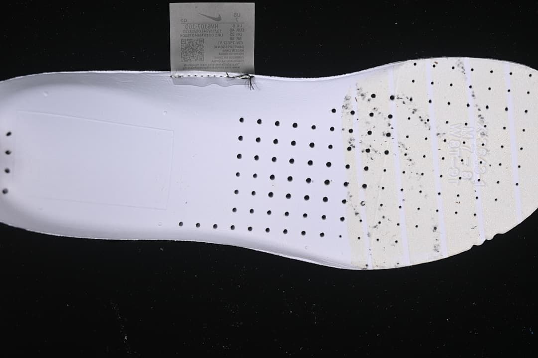 Underside of the shoe insole with perforations and printed markings