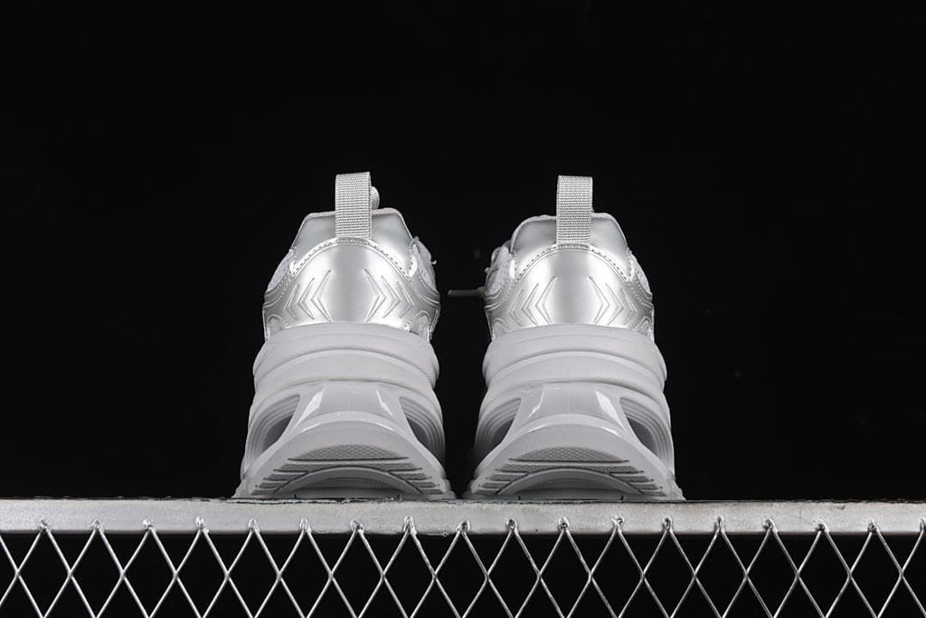 Rear view of the pair, showing heel pull loops and sculpted soles.
