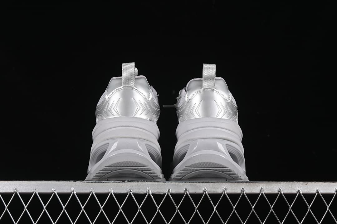 Rear view of the pair, showing heel pull loops and sculpted soles.